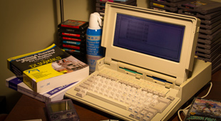 An image that we took of Matthew Langille's Tandy computer. Photoshop is handy for making it look like we have microsoft visual studio 2005 running on it